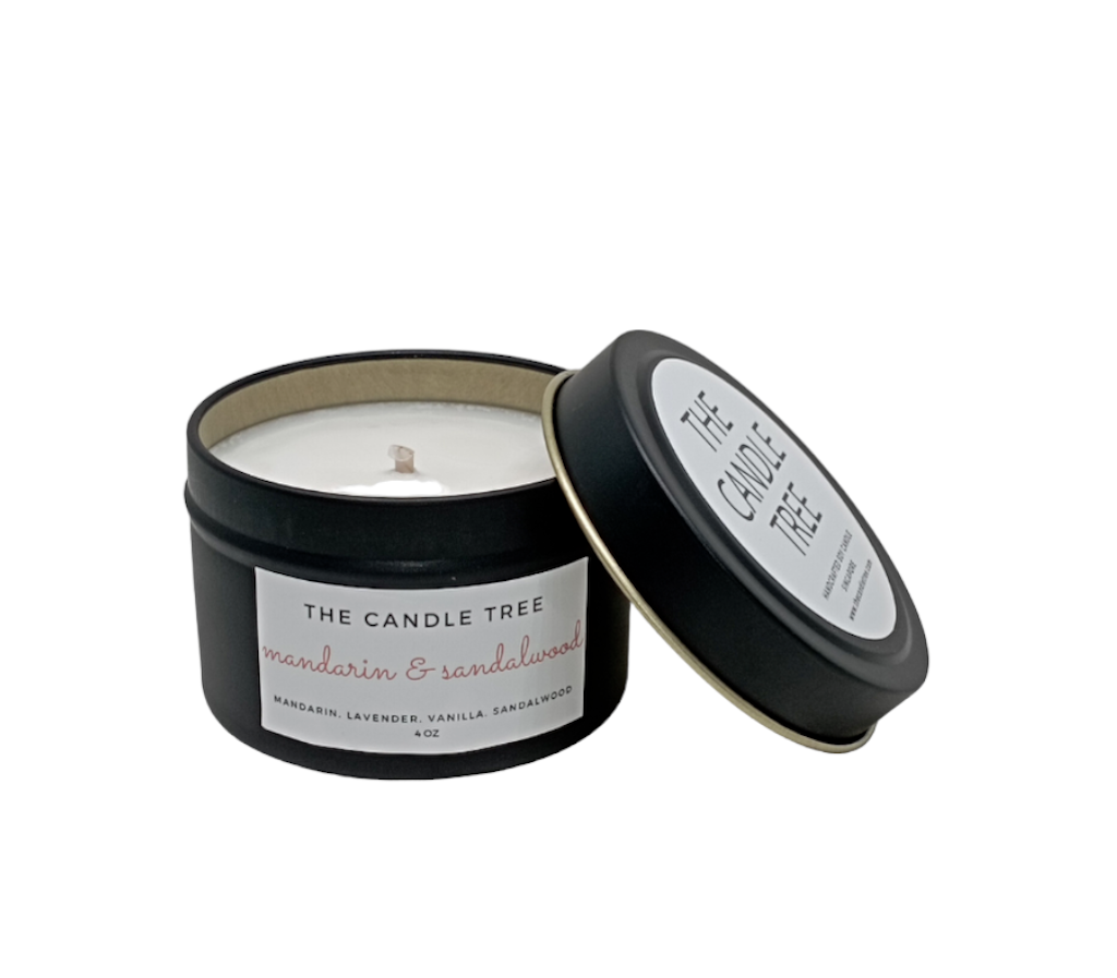 Candle in a black container featuring 'The Candle Tree' branding with a white background, scented 'Mandarin & Sandalwood.' Size 4oz
